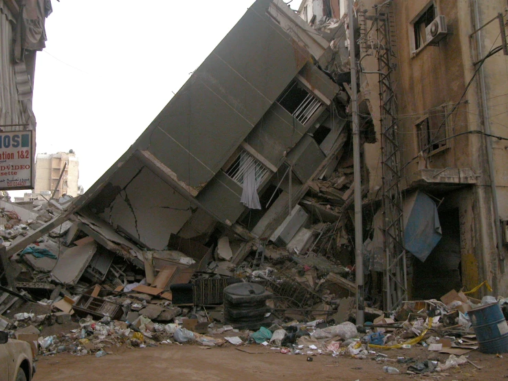 a street littered with trash and a building