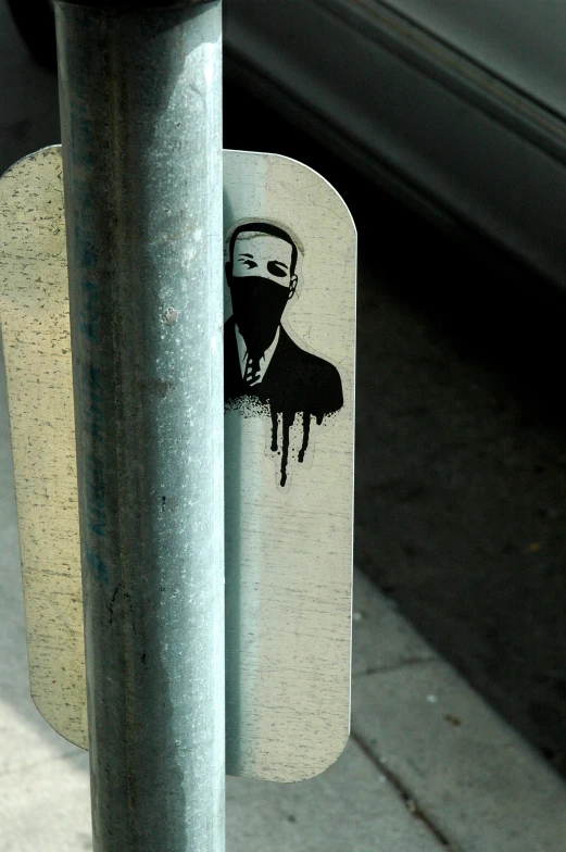 sticker of a man with a mask on his face