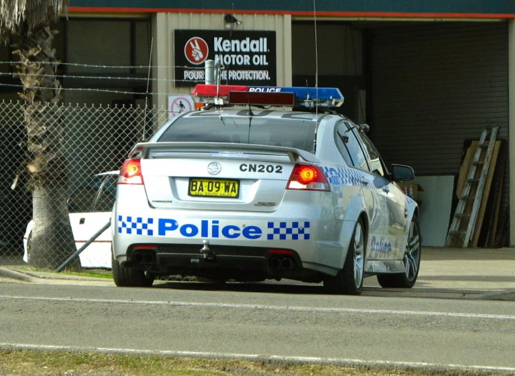 a police car parked on a side of the road