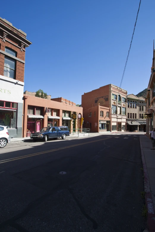 a small road with buildings on both sides