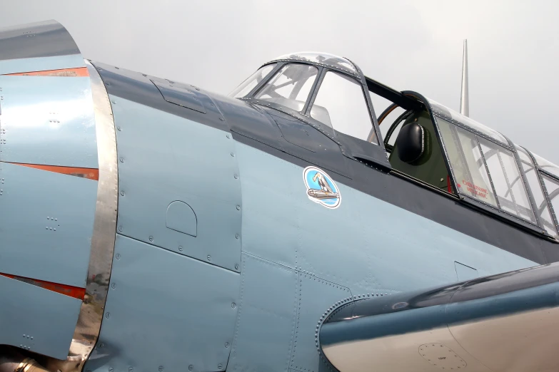 a plane with the nose up is on display