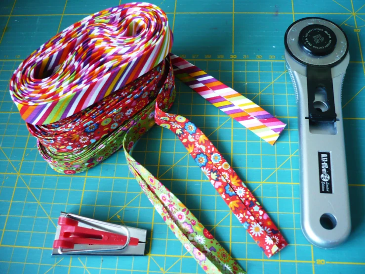 a variety of ribbon being used by an appliance