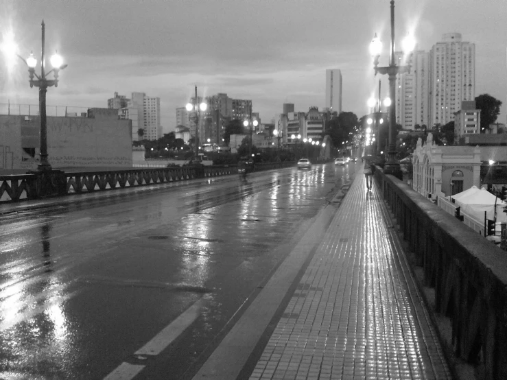a black and white po of a rainy street