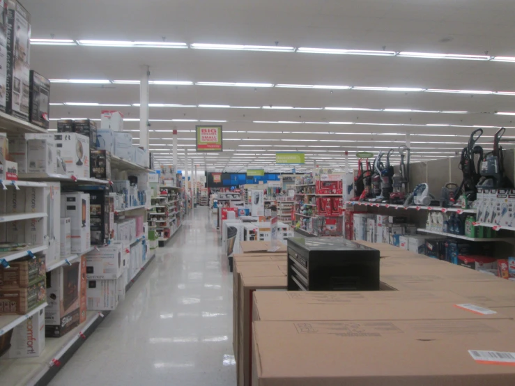 a store aisle with various items for sale