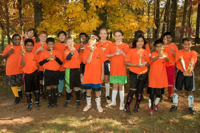 a soccer team is posing for a group picture