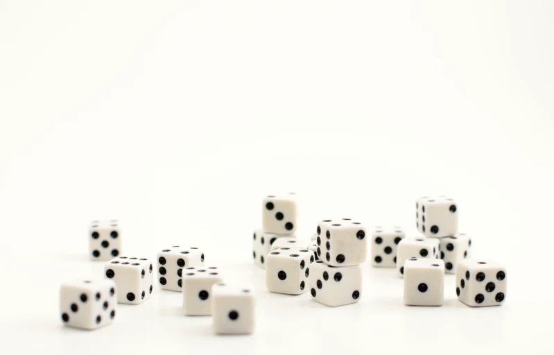 six dice and seven white dots with black dots on them