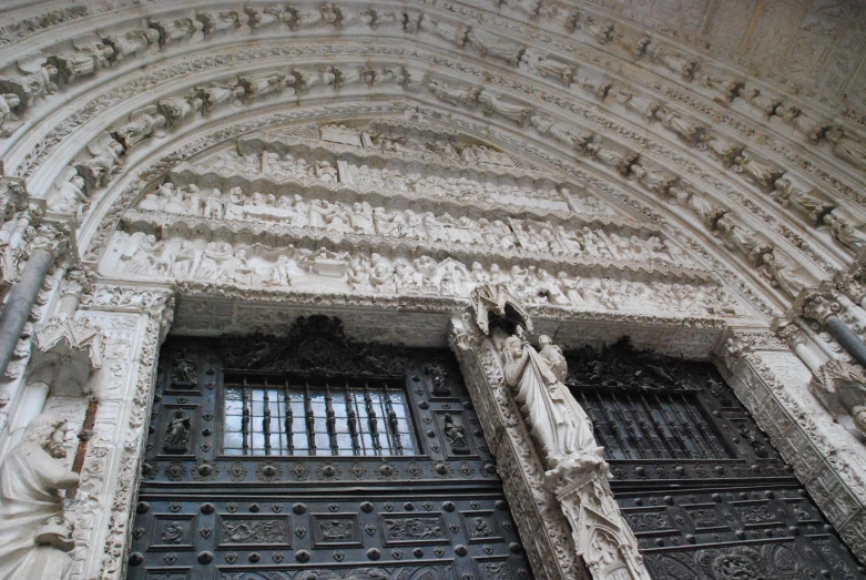 ornate architecture with statues, and windows in an old church