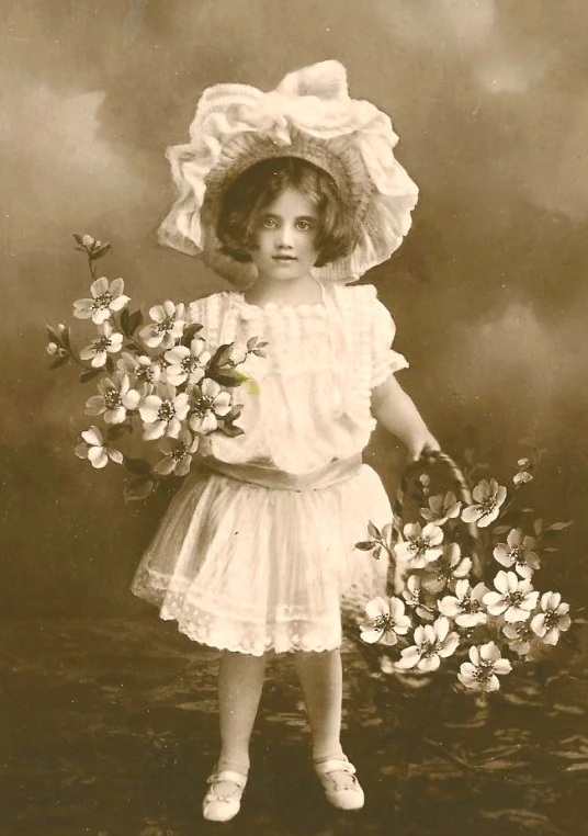 vintage po of  in dress and bonnet with flowers