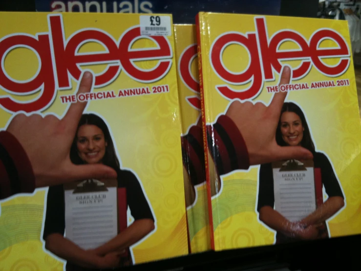 two pamphlets for the annual glee show are on display