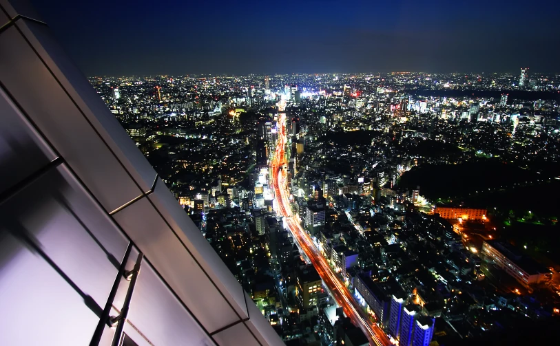 city lights from the top of a skyscr at night