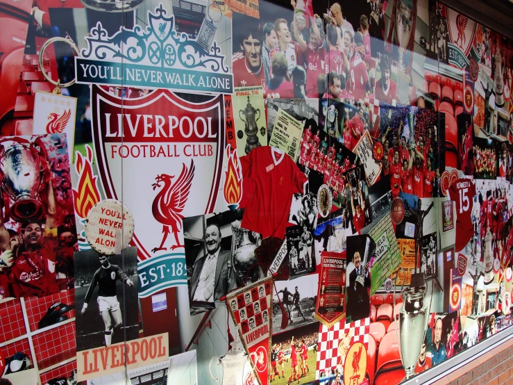 a display window with liverpool football memorabilia