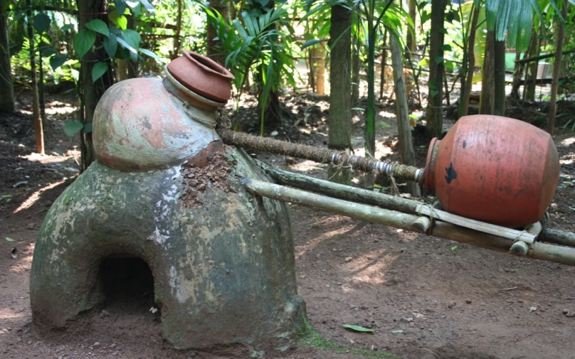 a very old stone work and a big pot