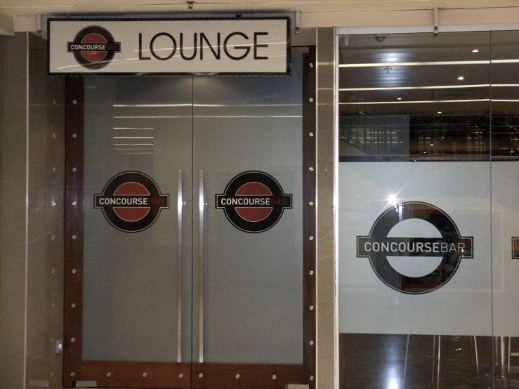 an elevator with a lounge logo on it