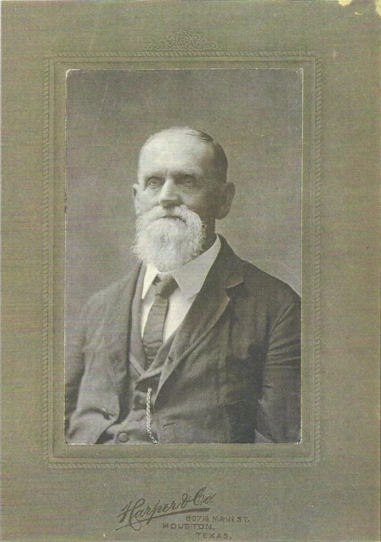 a pograph of an older man with a beard