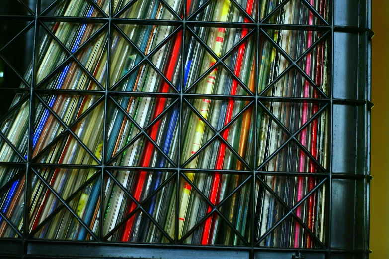 the wall has many pairs of colored plastic