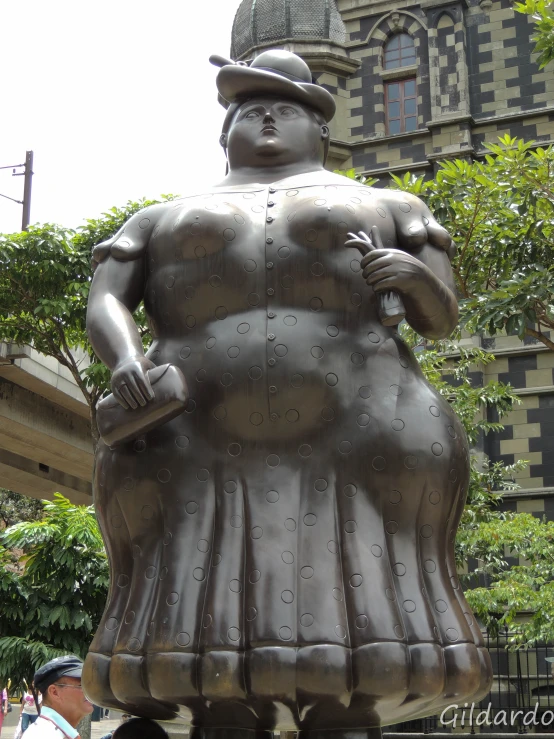 the statue has a huge woman on it