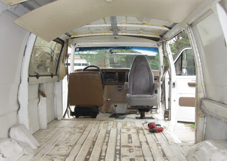 a view from the inside of a vehicle with the door open