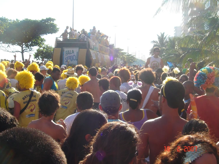 an elaborately dressed parade is shown with people