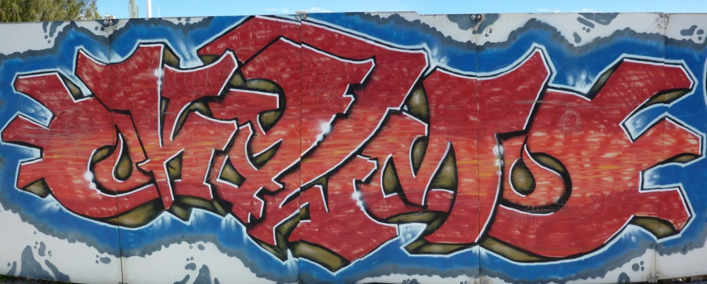 an image of graffiti on the side of a wall