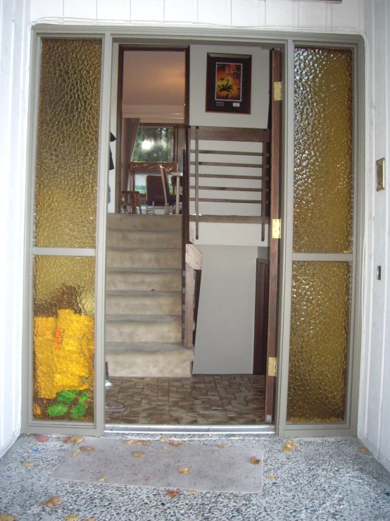 a po of a staircase through to a hallway