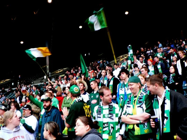 many soccer fans sit in an empty stadium