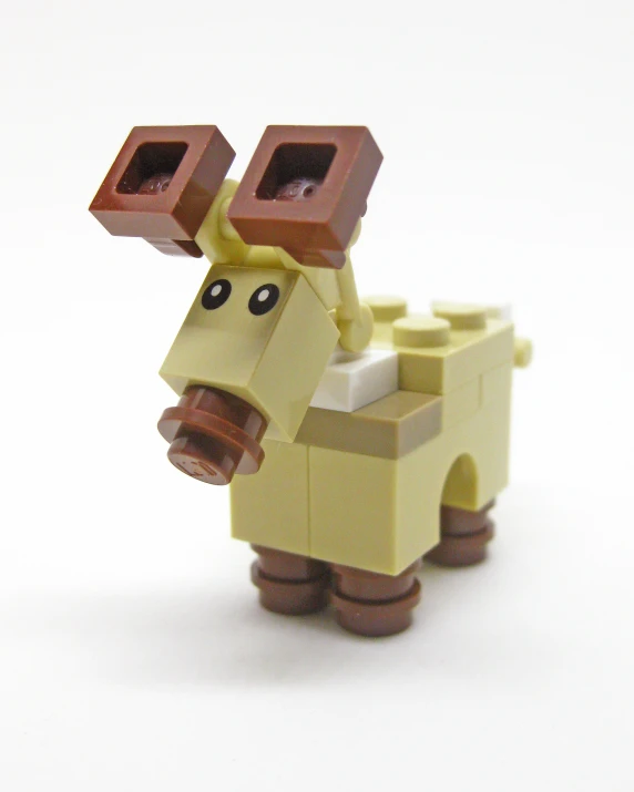 a lego pony figure has a brick like pattern on its head