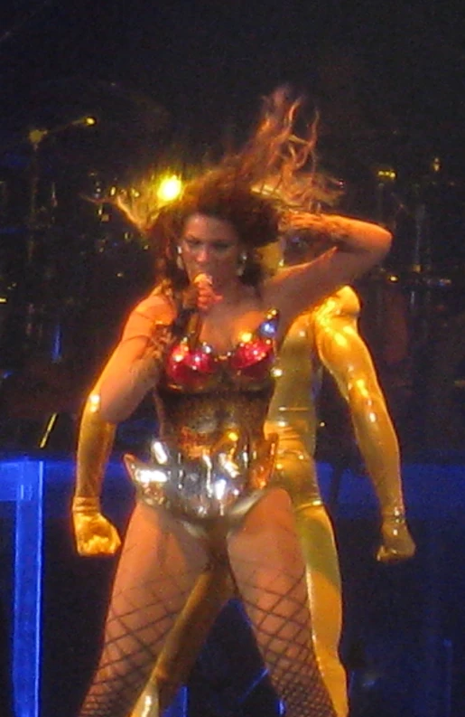 a person with a costume on standing on a stage
