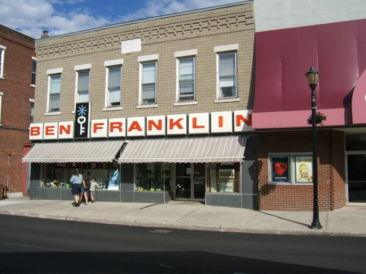 a view of some businesses that are located in front of each other