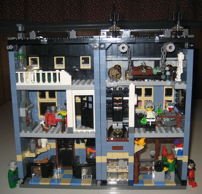 a toy house with legos in it is shown