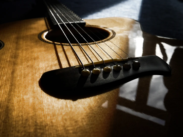 an ukulele with the strings showing on it