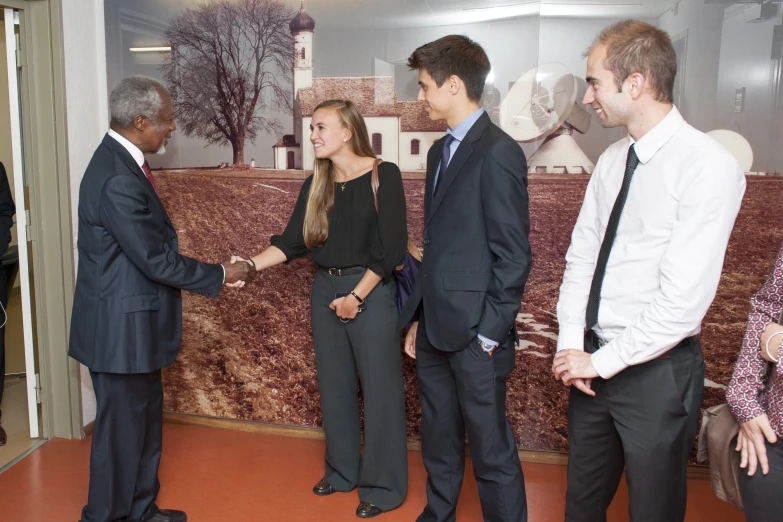 a group of business people in an office setting