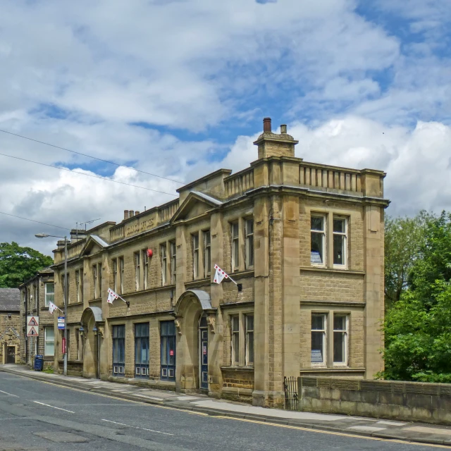 a big old building on the side of the road