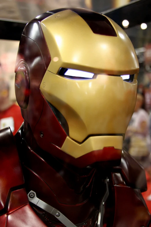iron man's helmet is displayed at an exhibition
