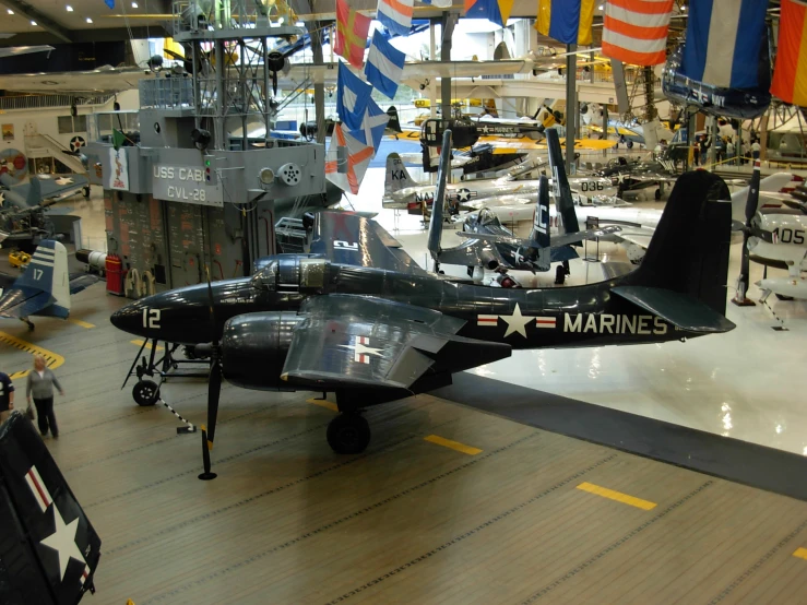 some airplanes are on display in a museum