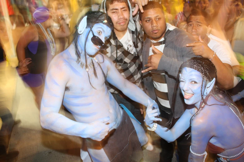 two men, one man dressed as an alien and the other man in costume