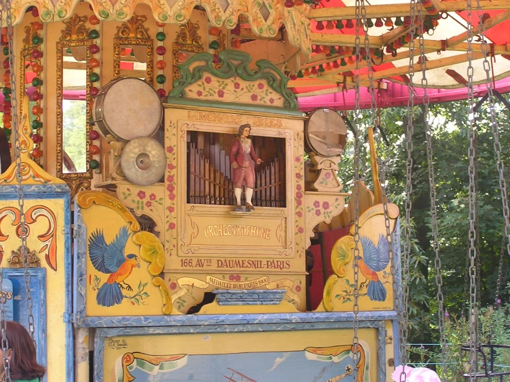 the carnival rides have colorful decorations on them