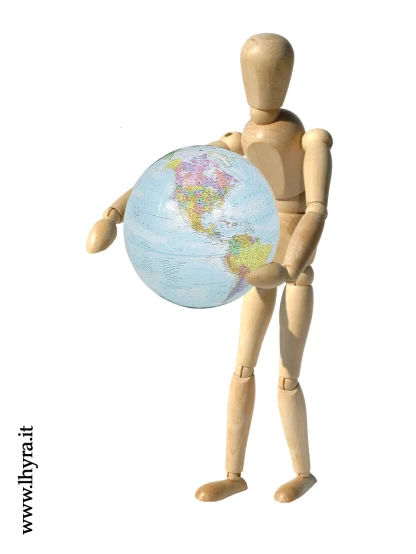 a wooden man holding a small blue and green globe