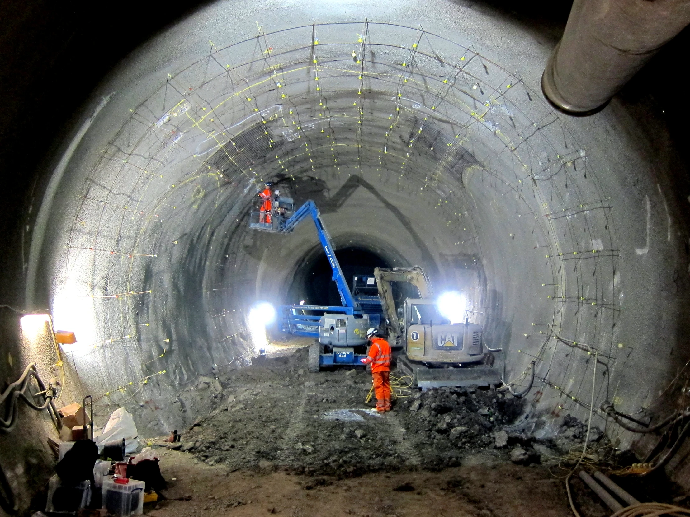 a large pipe in a tunnel is being worked