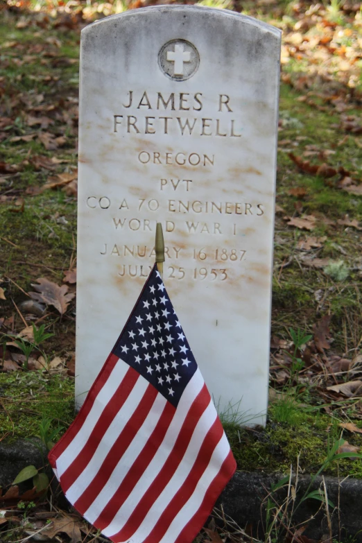 a american flag laying on a memorial