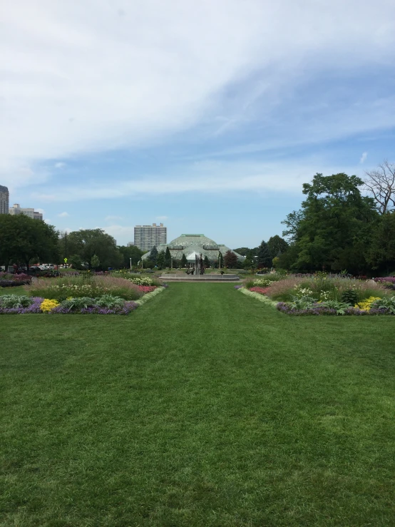 a park that has lots of flowers and trees