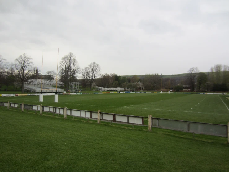 a baseball diamond is in the middle of an open field