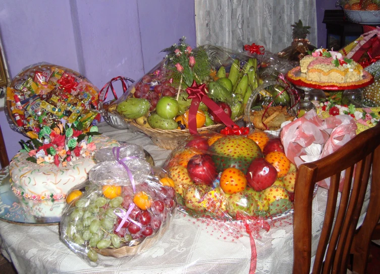 the table is covered with many different bowls and dishes