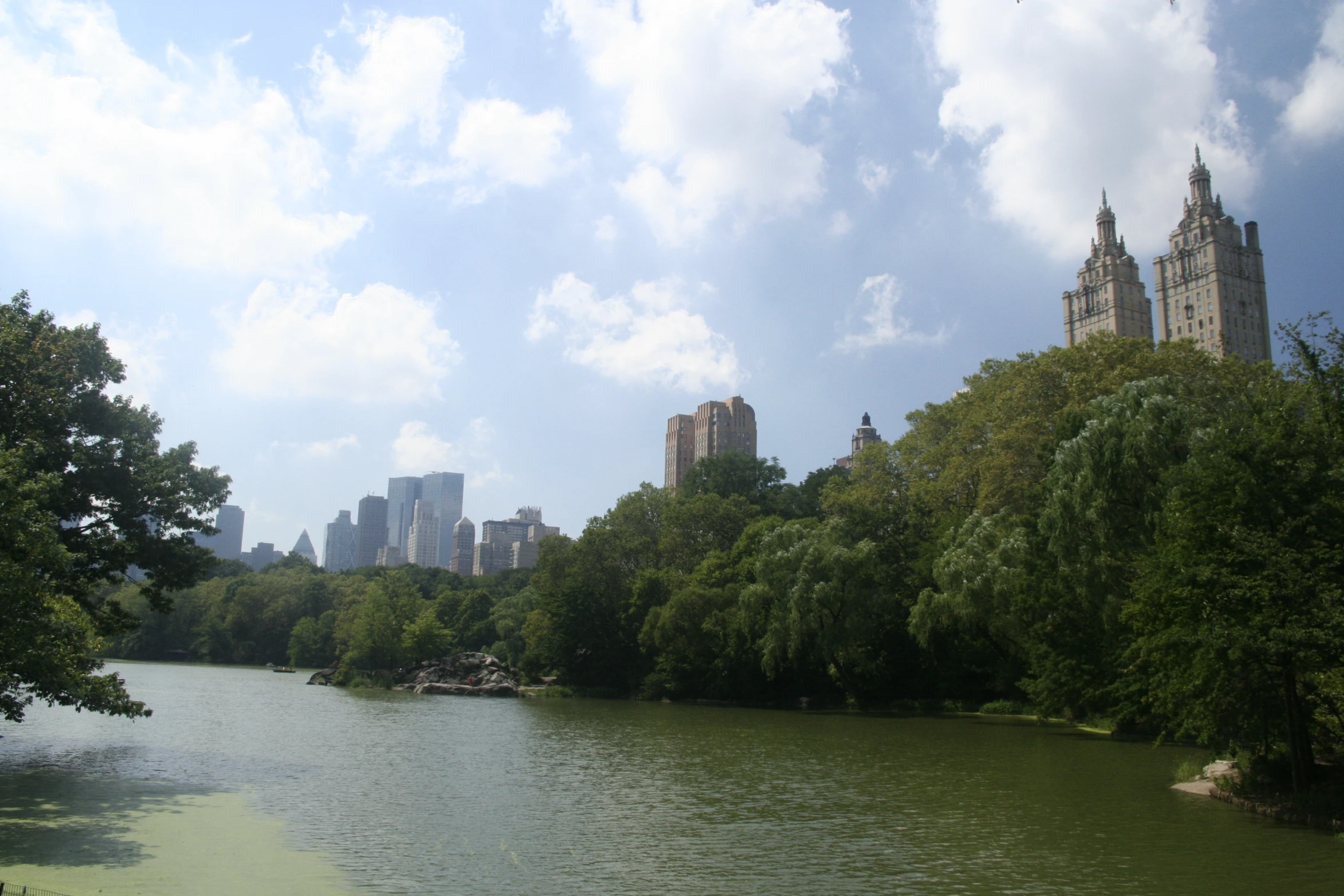 the trees surround a river with green water