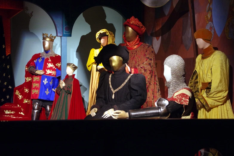 a display with mannequins dressed in medieval costumes