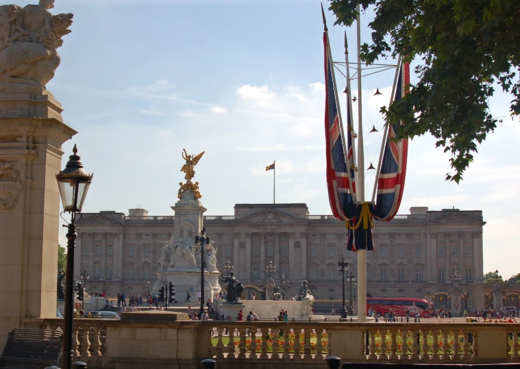 flags flying near the top of the statue