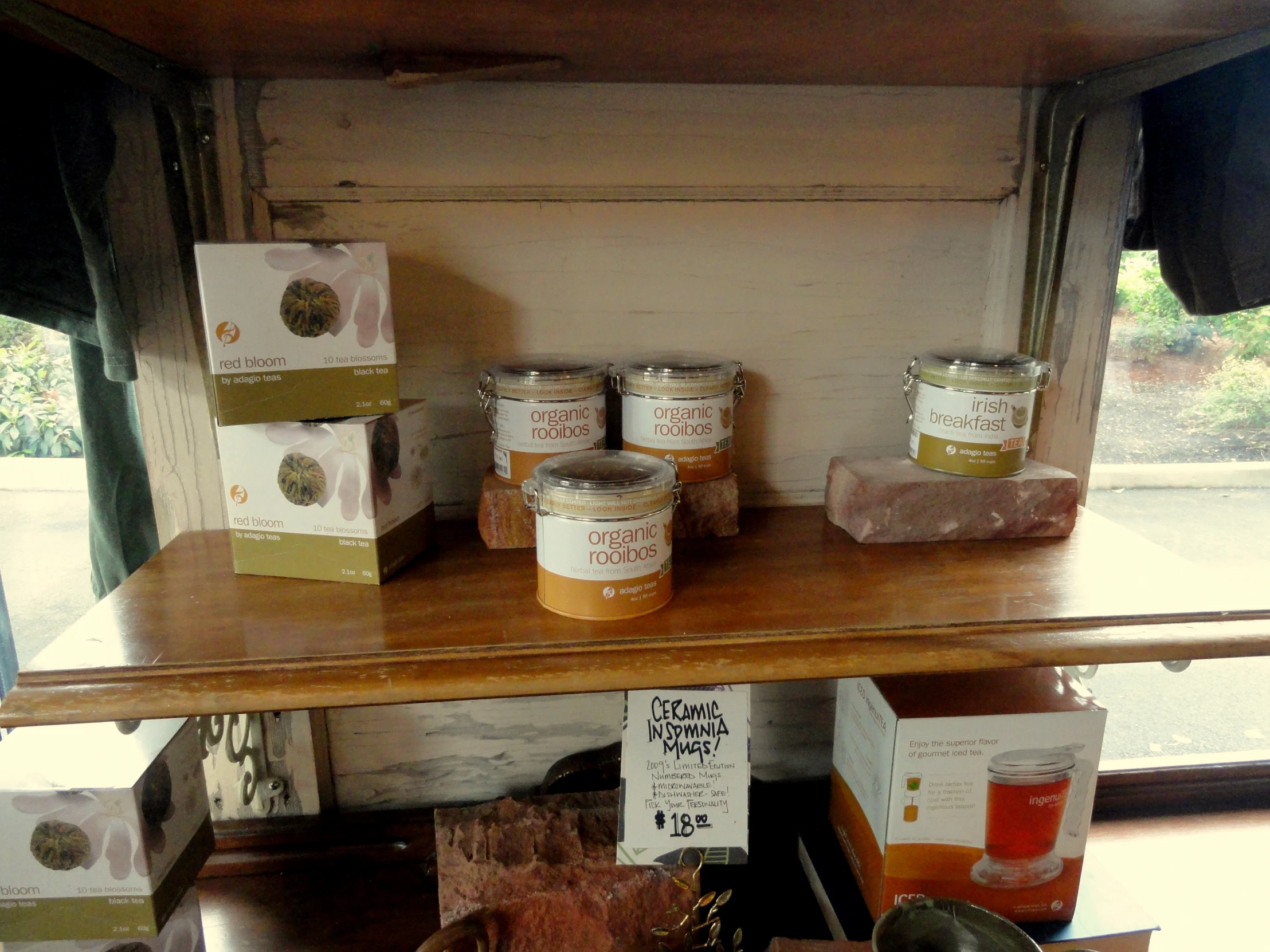 a shelf covered with boxes and various containers of food