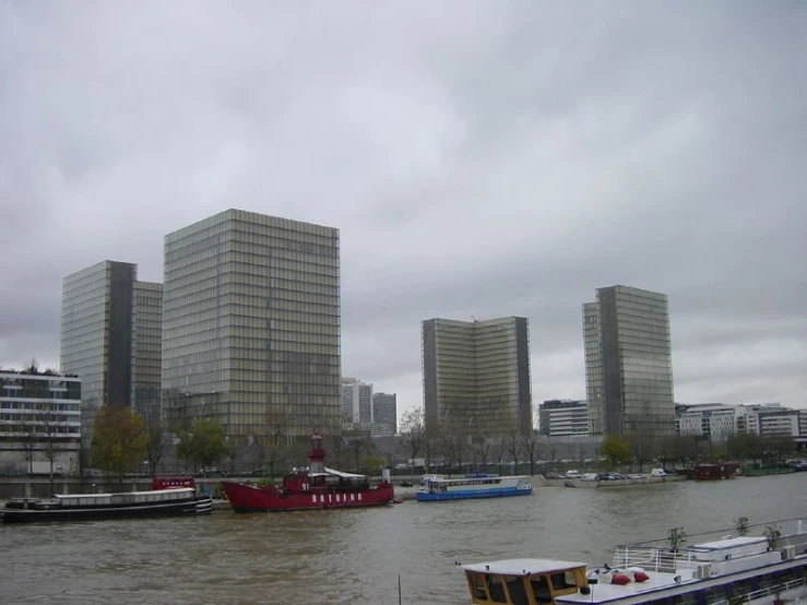 the boats are on the water in the city