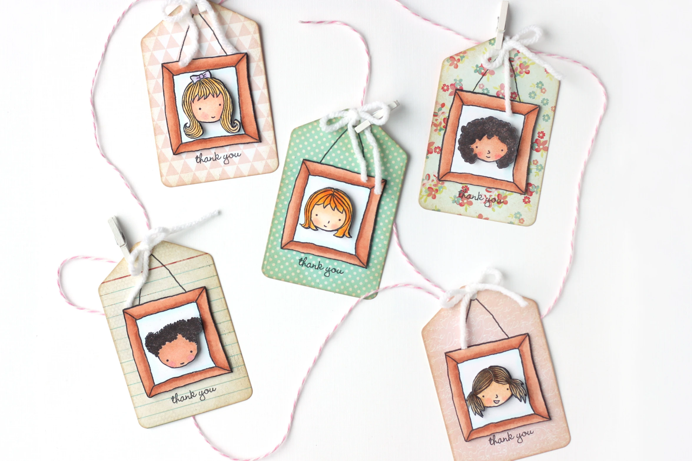 handmade personalized tags hang from twine