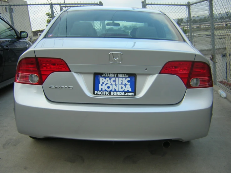 an image of a silver car with a tag on it