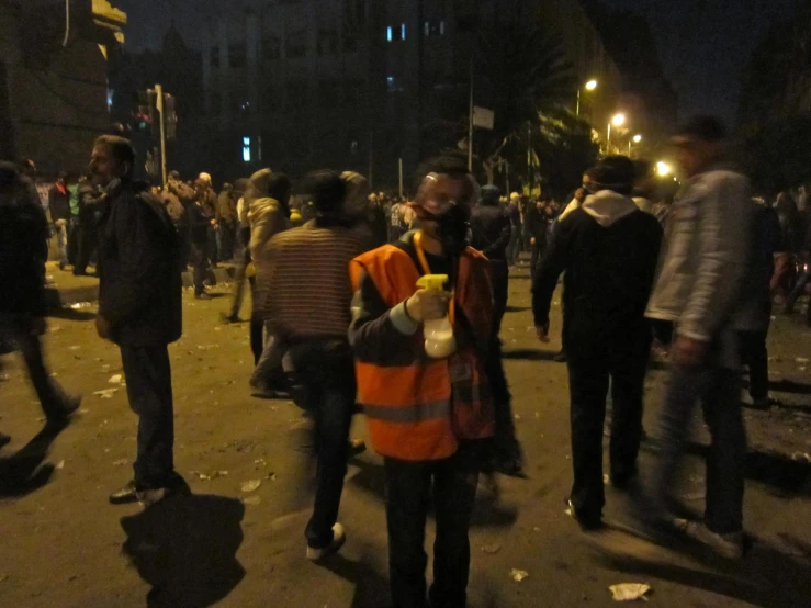 a man is standing alone on the street